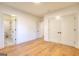 Bright bedroom with hardwood flooring and plenty of closet space and access to bathroom at 1947 Clark Dr, Tucker, GA 30084