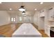 Open-concept kitchen area with large island and modern lighting at 1947 Clark Dr, Tucker, GA 30084