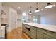 Modern kitchen with green cabinetry, stainless steel appliances, and a large island at 1947 Clark Dr, Tucker, GA 30084