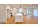 Spacious kitchen with a large island, modern appliances, and hardwood floors at 1947 Clark Dr, Tucker, GA 30084