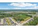 Aerial view of a sprawling neighborhood with mature trees and well-maintained homes in a serene setting at 247 Widener Way, Peachtree City, GA 30269