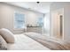 Neutral bedroom with plush blanket and dresser near a bright window at 247 Widener Way, Peachtree City, GA 30269