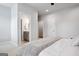 Cozy bedroom with ensuite bathroom featuring a plush throw blanket at 247 Widener Way, Peachtree City, GA 30269