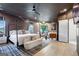 Beautiful main bedroom features a four-poster bed, accent lighting, and ample natural light at 247 Widener Way, Peachtree City, GA 30269