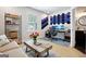 Office space featuring natural light, a modern desk, and blue accents at 247 Widener Way, Peachtree City, GA 30269