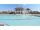 Community pool and clubhouse with ample seating, perfect for relaxation and social gatherings at 247 Widener Way, Peachtree City, GA 30269