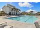 Community pool and clubhouse with ample seating, perfect for relaxation and social gatherings at 247 Widener Way, Peachtree City, GA 30269