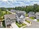 Charming neighborhood view featuring beautifully designed homes, lush lawns, and tree-lined streets at 247 Widener Way, Peachtree City, GA 30269