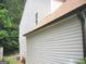 Close-up of the home's siding and gutter system at 4383 Chestnut Lake Ave, Lithonia, GA 30038