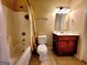 Bathroom with tile flooring, shower, vanity and toilet at 180 Oakland Hills Way, Lawrenceville, GA 30044