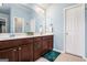 Bathroom with double vanity, modern fixtures, and plenty of counter space at 230 Haleys Ct, Woodstock, GA 30188