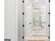 Bathroom showcasing a frameless shower, freestanding tub, marble tile and dual closets at 915 Laurel Brooke Ave, Peachtree City, GA 30269