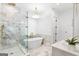 Bright bathroom with a freestanding tub, luxurious shower, and modern fixtures at 915 Laurel Brooke Ave, Peachtree City, GA 30269
