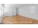 Spacious bonus room/bedroom with hardwood floors and ample natural light at 915 Laurel Brooke Ave, Peachtree City, GA 30269