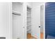 Closet featuring white built in shelves and rod at 915 Laurel Brooke Ave, Peachtree City, GA 30269