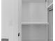 Interior shot of a bright, white closet with shelving and ample space at 915 Laurel Brooke Ave, Peachtree City, GA 30269