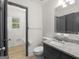 Bathroom with granite vanity and tiled shower/tub at 3548 Meadowview Ct, Rex, GA 30273