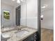 Granite vanity top in this renovated bathroom at 3548 Meadowview Ct, Rex, GA 30273