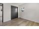 Cozy bedroom with a black closet and wood flooring at 3548 Meadowview Ct, Rex, GA 30273