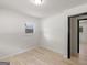 Well-lit bedroom with wood floors at 3548 Meadowview Ct, Rex, GA 30273
