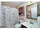 Comfortable bathroom with a shower, sink, and cabinet at 127 Laurel Springs Dr, Mcdonough, GA 30253
