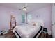Cozy bedroom with hardwood floors, lots of light, and a ceiling fan at 127 Laurel Springs Dr, Mcdonough, GA 30253