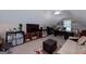 Spacious bonus room offering flexible living space with room for seating, shelving, and a desk area at 127 Laurel Springs Dr, Mcdonough, GA 30253