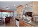 Eat-in kitchen featuring a stainless steel sink, sleek appliances, and a bay window offering great light at 127 Laurel Springs Dr, Mcdonough, GA 30253