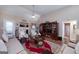 Cozy living room featuring a fireplace, built-in shelving, and comfortable seating at 127 Laurel Springs Dr, Mcdonough, GA 30253