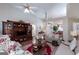 Spacious living room featuring a large entertainment center and comfortable seating at 127 Laurel Springs Dr, Mcdonough, GA 30253