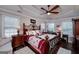 Main bedroom featuring trey ceilings, lots of natural light, and a stately bed frame at 127 Laurel Springs Dr, Mcdonough, GA 30253