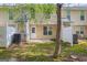 Backyard with a cozy patio area, perfect for outdoor dining and relaxing at 1851 Grove Way, Hampton, GA 30228