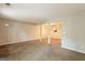 Finished basement offering ample space for activities, featuring neutral walls and carpeted floors at 1851 Grove Way, Hampton, GA 30228