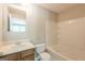 Clean bathroom with a tub-shower combination, vanity with sink, and great lighting at 1851 Grove Way, Hampton, GA 30228
