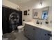Stylish bathroom featuring a modern vanity and designer shower curtain at 401 Bainbridge Dr, Mcdonough, GA 30253
