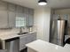 Well-equipped kitchen featuring stainless steel appliances and quartz countertops at 401 Bainbridge Dr, Mcdonough, GA 30253