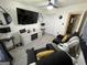 Comfortable living room featuring modern decor and plenty of seating at 401 Bainbridge Dr, Mcdonough, GA 30253