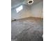 Bedroom with textured carpet, a large window, and white walls at 2884 Mountbery Dr, Snellville, GA 30039