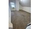 Bedroom with textured carpet, a window, and white walls at 2884 Mountbery Dr, Snellville, GA 30039
