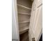Shelved closet with tan carpet at 2884 Mountbery Dr, Snellville, GA 30039