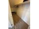 Hall closet with hangers and a bench at 2884 Mountbery Dr, Snellville, GA 30039