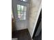 A door with glass panels and a pet door, providing outdoor access at 2884 Mountbery Dr, Snellville, GA 30039