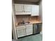 Kitchen sink with wood counters and stainless steel dishwasher at 2884 Mountbery Dr, Snellville, GA 30039