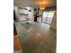 Bright kitchen with island, white cabinets, and gas stove at 2884 Mountbery Dr, Snellville, GA 30039