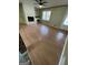 Cozy living room features a classic fireplace, hardwood floors, and a bright window at 2884 Mountbery Dr, Snellville, GA 30039