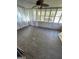 Sunroom featuring a ceiling fan and multiple windows, offering natural light at 2884 Mountbery Dr, Snellville, GA 30039