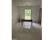 Bedroom with one window overlooking greenery at 2968 Par Lorraine, Lithonia, GA 30038
