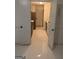 View into kitchen featuring stainless appliances and freshly painted cabinets at 2968 Par Lorraine, Lithonia, GA 30038