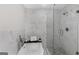 Elegant bathroom showcasing a soaking tub and glass-enclosed shower with tile accents at 389 Oglesby Bridge, Conyers, GA 30094