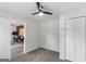 Bright bedroom features a ceiling fan and closet, offering a clean and simple design at 389 Oglesby Bridge, Conyers, GA 30094